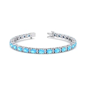 6 Carat Oval Shape Blue Topaz and Diamond Bracelet In 14 Karat White Gold, 7 Inches