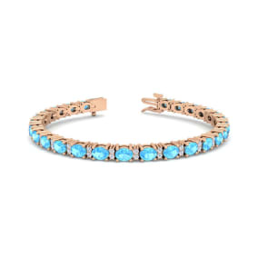 6 Carat Oval Shape Blue Topaz and Diamond Bracelet In 14 Karat Rose Gold, 7 Inches