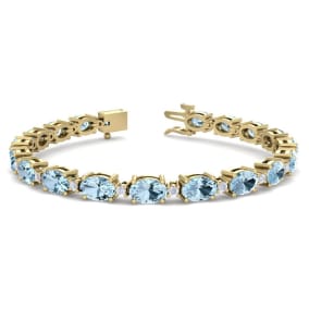 Aquamarine Bracelet: Aquamarine Jewelry: 9 Carat Oval Shape Aquamarine and Diamond Bracelet In 14 Karat Yellow Gold, 7 Inches