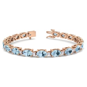 Aquamarine Bracelet: Aquamarine Jewelry: 9 Carat Oval Shape Aquamarine and Diamond Bracelet In 14 Karat Rose Gold, 7 Inches