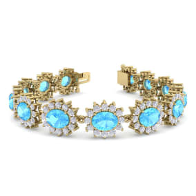 24 Carat Oval Shape Blue Topaz and Halo Diamond Bracelet In 14 Karat Yellow Gold, 7 Inches
