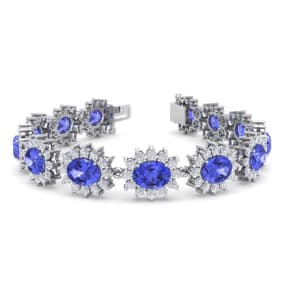 21 Carat Oval Shape Tanzanite and Halo Diamond Bracelet In 14 Karat White Gold, 7 Inches