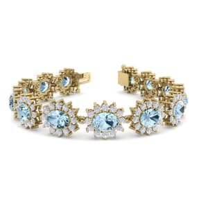 19 Carat Oval Shape Aquamarine and Halo Diamond Bracelet In 14 Karat Yellow Gold, 7 Inches