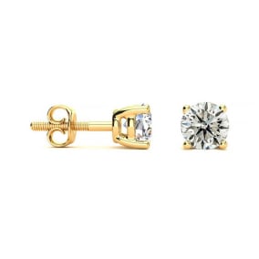 Nearly 3/4 Carat Natural Colorless Diamond Stud Earrings In 14 Karat Yellow Gold