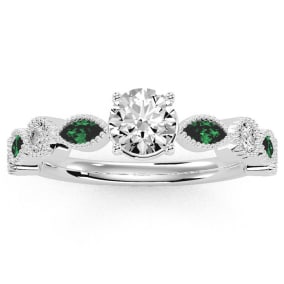 1 1/4 Carat Round and Marquise Vintage Diamond and Emerald Engagement Ring In 14 Karat White Gold