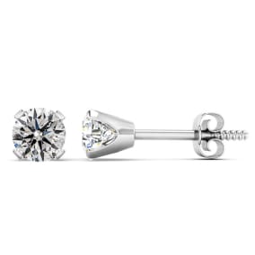 Almost 3/4 Carat Round Diamond Stud Earrings In 14 Karat White Gold