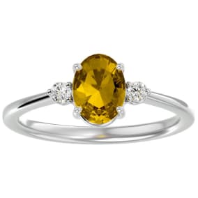 1.15 Carat Oval Shape Citrine and Two Diamond Ring In 14 Karat White Gold