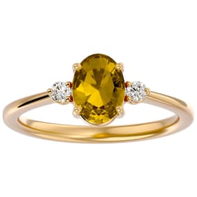 1.15 Carat Oval Shape Citrine and Two Diamond Ring In 14 Karat Yellow Gold