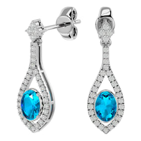 2 1/2 Carat Oval Shape Blue Topaz and Diamond Dangle Earrings In 14 Karat White Gold