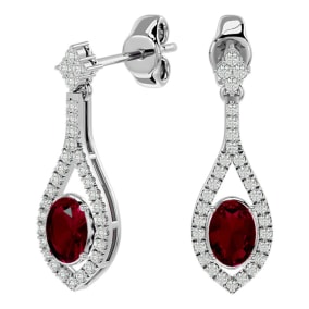 2 1/2 Carat Oval Shape Ruby and Diamond Dangle Earrings In 14 Karat White Gold