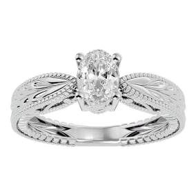 3/4 Carat Oval Shape Moissanite Solitaire Engagement Ring with Tapered Etched Band In 14 Karat White Gold