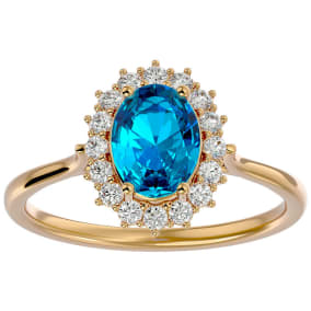 1 3/4 Carat Oval Shape Blue Topaz and Halo Diamond Ring In 14 Karat Yellow Gold