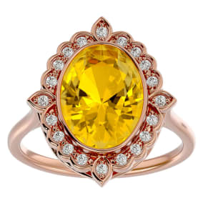 1 1/4 Carat Oval Shape Citrine and Halo Diamond Ring In 14 Karat Rose Gold