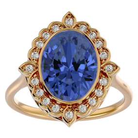 1 1/2 Carat Oval Shape Tanzanite and Halo Diamond Ring In 14 Karat Yellow Gold