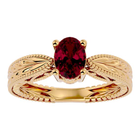 1 1/2 Carat Oval Shape Ruby Ring With Tapered Etched Band In 14 Karat Yellow Gold