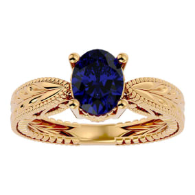 2 3/4 Carat Oval Shape Sapphire Ring With Tapered Etched Band In 14 Karat Yellow Gold