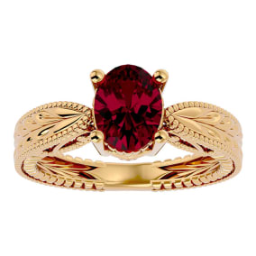 2 3/4 Carat Oval Shape Ruby Ring With Tapered Etched Band In 14 Karat Yellow Gold