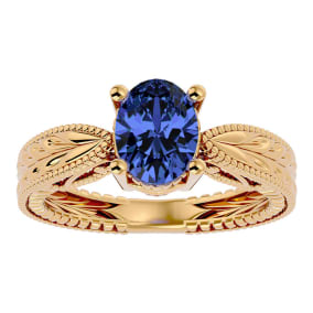 2 Carat Oval Shape Tanzanite Ring With Tapered Etched Band In 14 Karat Yellow Gold