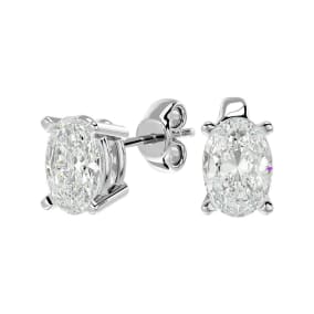 1 1/2 Carat Oval Shape Moissanite Stud Earrings In 14 Karat White Gold