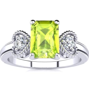 1 1/4 Carat Peridot and Two Diamond Heart Ring In 1.4 Karat White Gold™