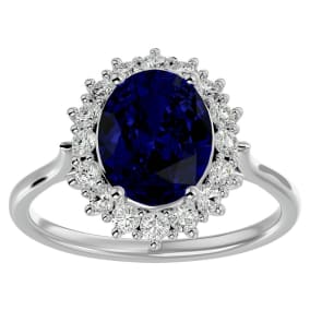 3.60 Carat Oval Shape Sapphire and Halo Diamond Ring In 14 Karat White Gold