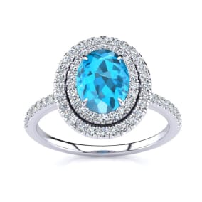 Blue Topaz Ring: 1 1/2 Carat Oval Shape Blue Topaz and Double Halo Diamond Ring In Sterling Silver