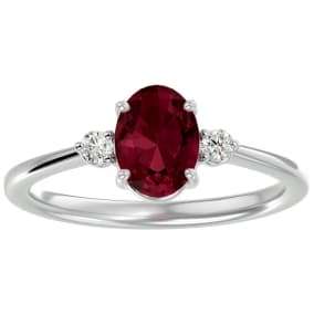 Garnet Ring: 1 1/3 Carat Oval Shape Garnet and Two Diamond Ring In Sterling Silver