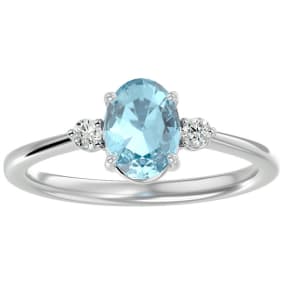 1 1/3 Carat Oval Shape Aquamarine and Two Diamond Ring In Sterling Silver