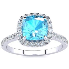 Blue Topaz Ring: 2 Carat Cushion Cut Blue Topaz and Halo Diamond Ring In Sterling Silver