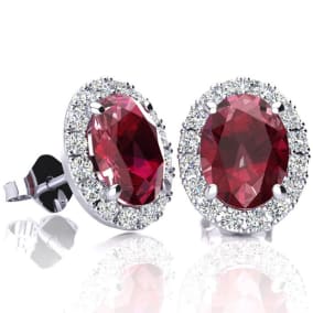 2 1/4 Carat Oval Shape Ruby and Halo Diamond Earrings In Sterling Silver