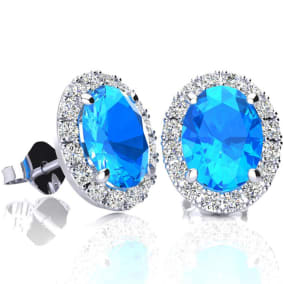 2 3/4 Carat Oval Shape Blue Topaz and Halo Diamond Earrings In Sterling Silver