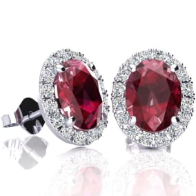 2 3/4 Carat Oval Shape Ruby and Halo Diamond Earrings In Sterling Silver
