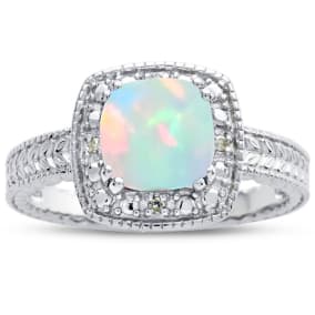 Opal Ring: 1 1/4 Carat Cushion Cut Created Opal and Halo Diamond Ring In Sterling Silver