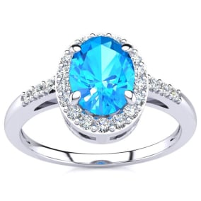Blue Topaz Ring: 1 Carat Oval Shape Blue Topaz and Halo Diamond Ring In Sterling Silver