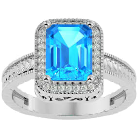 Blue Topaz Ring: 2 3/4 Carat Emerald Shape Blue Topaz and Diamond Ring In Sterling Silver