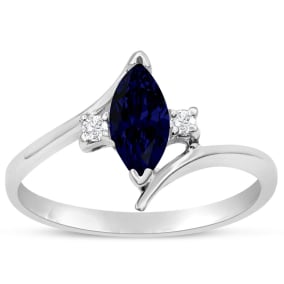 Sapphire Ring: 1/2 Carat Marquise Shape Created Sapphire and Diamond Ring In Sterling Silver