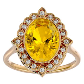 Retrograde Birthstones™ 1 1/4 Carat Oval Shape Citrine and Halo Diamond Ring In 14 Karat Yellow Gold