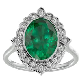 Retrograde Birthstones™ 1 1/3 Carat Oval Shape Emerald and Halo Diamond Ring In 14 Karat White Gold