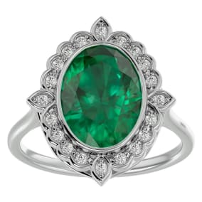 1 1/3 Carat Oval Shape Emerald and Halo Diamond Ring In 14 Karat White Gold