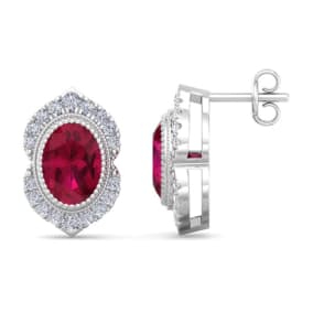 Retrograde Birthstones™ 2 1/2 Carat Oval Shape Ruby and Diamond Earrings In 14K White Gold