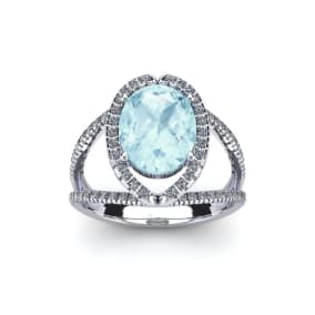 Retrograde Birthstones™ 1 1/2 Carat Oval Shape Aquamarine and Halo Diamond Ring In 14 Karat White Gold
