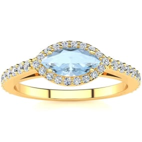 Retrograde Birthstones™ 3/4 Carat Marquise Shape Aquamarine and Halo Diamond Ring In 14 Karat Yellow Gold