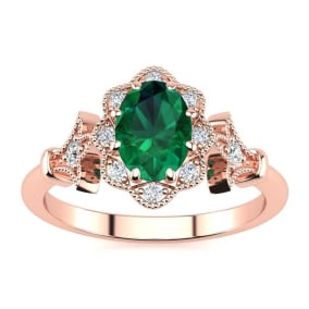 1 Carat Oval Shape Emerald and Halo Diamond Vintage Ring In 14 Karat Rose Gold