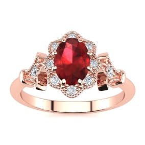 1 Carat Oval Shape Ruby and Halo Diamond Vintage Ring In 14 Karat Rose Gold