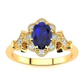 Retrograde Birthstones™ 1 Carat Oval Shape Sapphire and Halo Diamond Vintage Ring In 14 Karat Yellow Gold