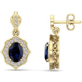 Retrograde Birthstones™ 2 1/4 Carat Oval Shape Sapphire and Diamond Dangle Earrings In 14 Karat Yellow Gold