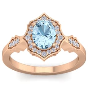 Aquamarine Ring: Aquamarine Jewelry: 1 1/2 Carat Oval Shape Aquamarine and Diamond Ring In 14 Karat Rose Gold