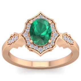 1 1/2 Carat Oval Shape Emerald and Diamond Ring In 14 Karat Rose Gold