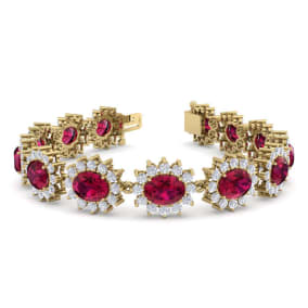 Retrograde Birthstones™ 25 Carat Oval Shape Ruby and Halo Diamond Bracelet In 14 Karat Yellow Gold, 7 Inches