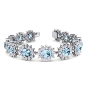 Retrograde Birthstones™ 19 Carat Oval Shape Aquamarine and Halo Diamond Bracelet In 14 Karat White Gold, 7 Inches
